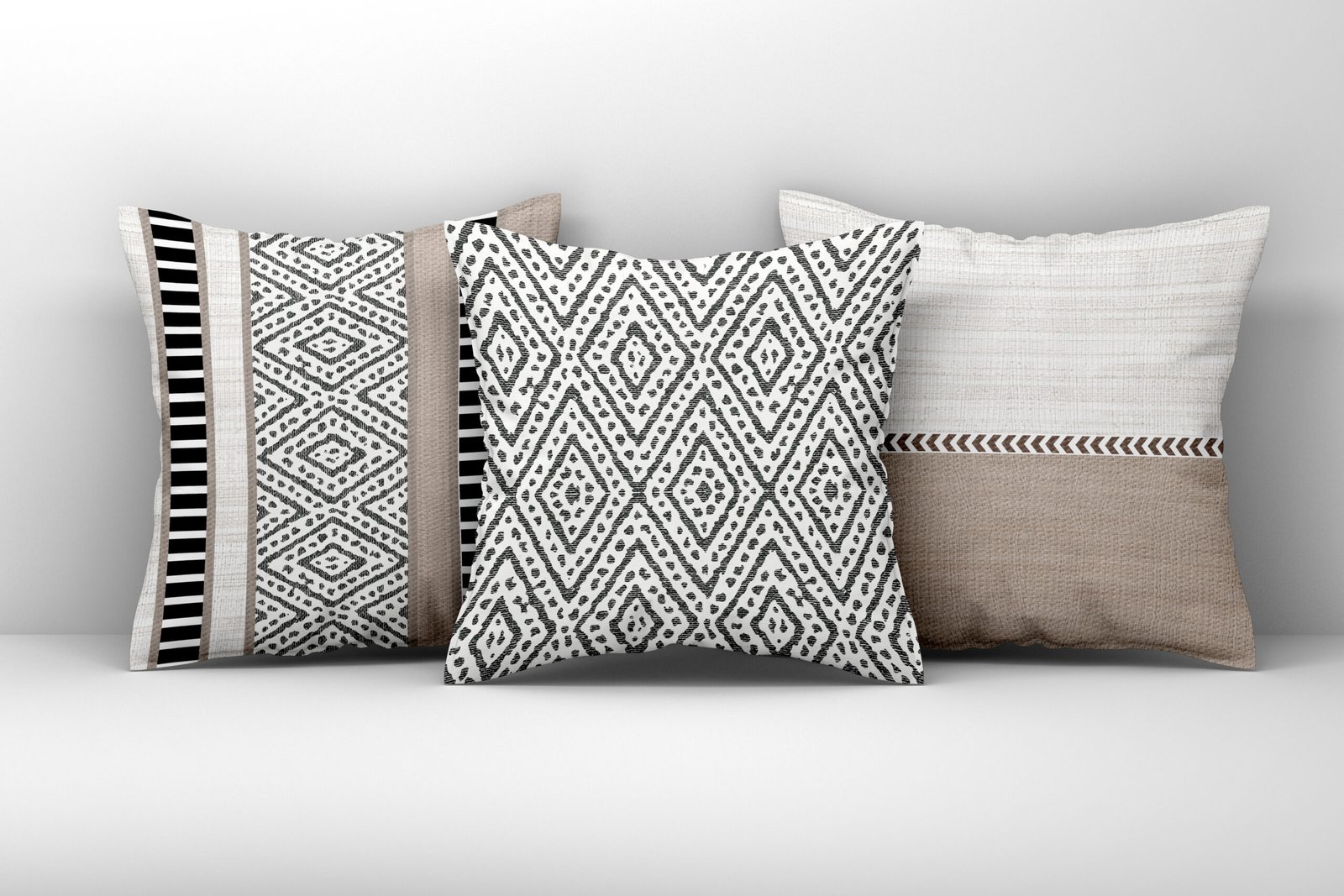 Mockup of three large white pillows