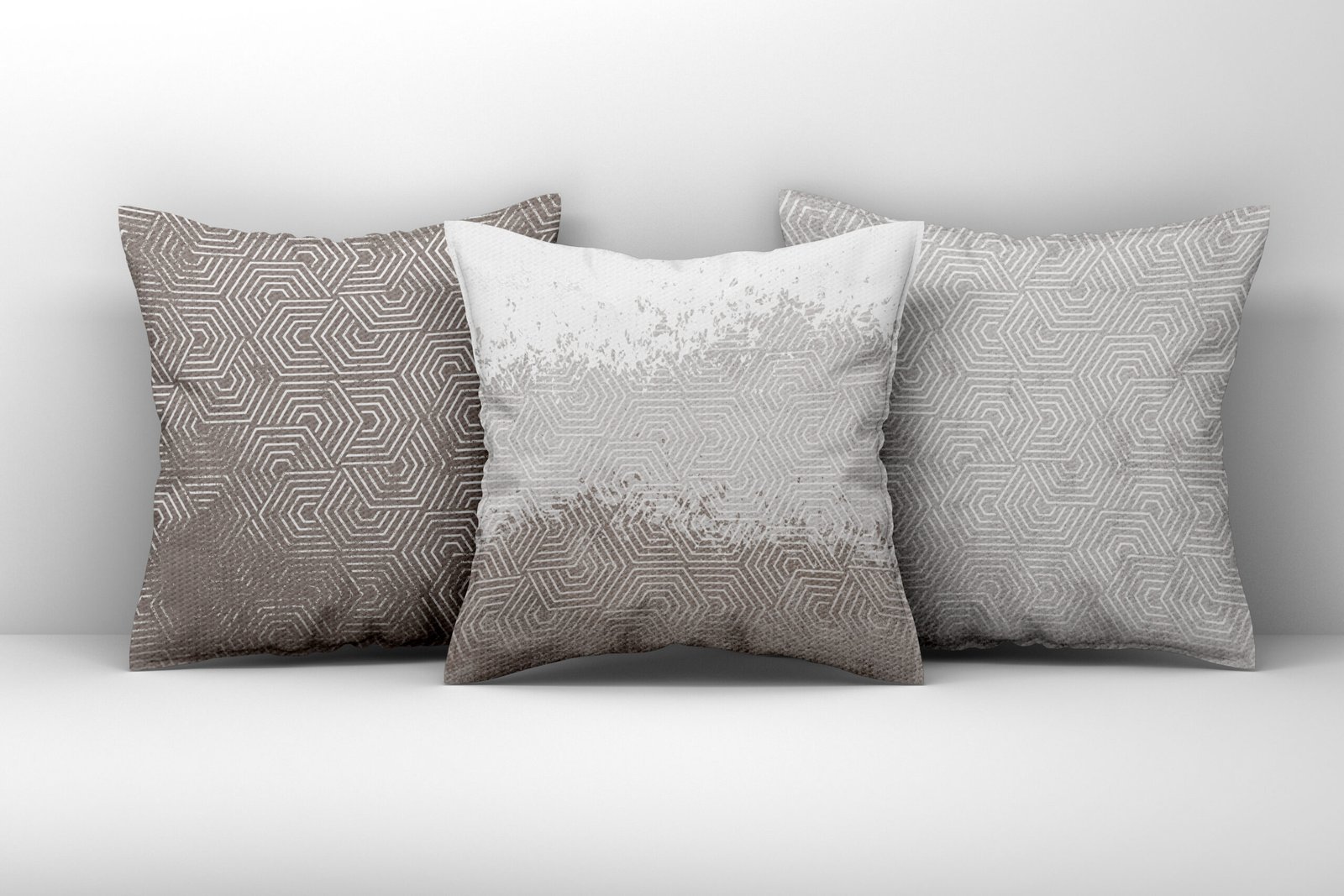 Mockup of three large white pillows